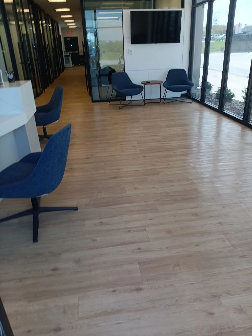Clean bank office lobby with wood floors